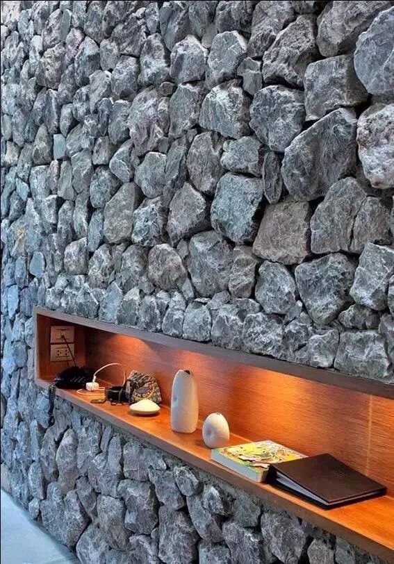 自己盖房子用捡来的石头做外墙够美
